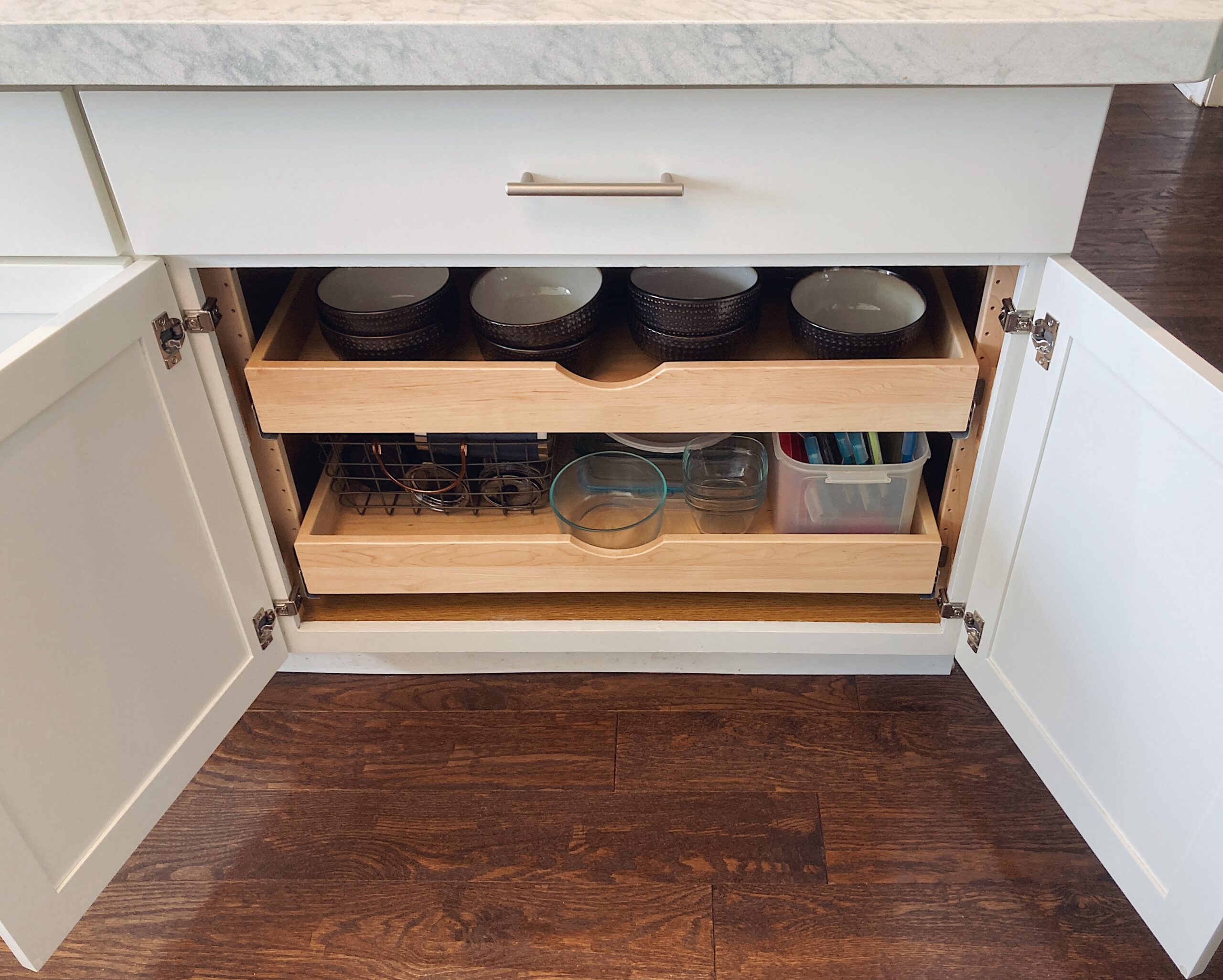 pull out drawers in a kitchen cabinet